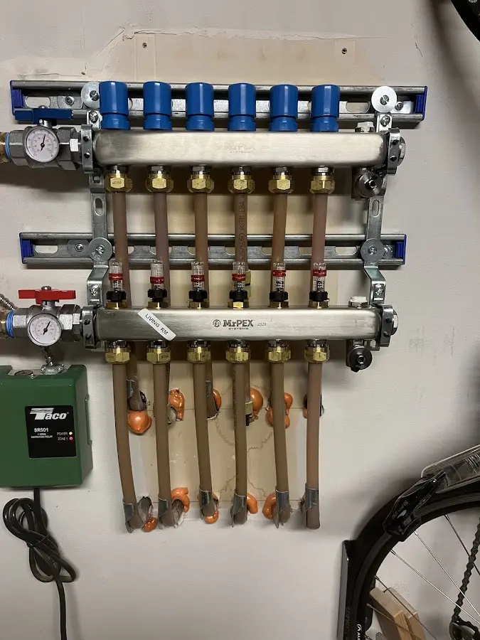 Plumber performing Gas Line Installation at a residential property in Lysander